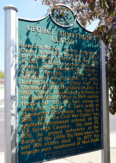 State historic marker back dediated to George Custer in Monroe. Image ©2015 Look Around You Ventures, LLC.